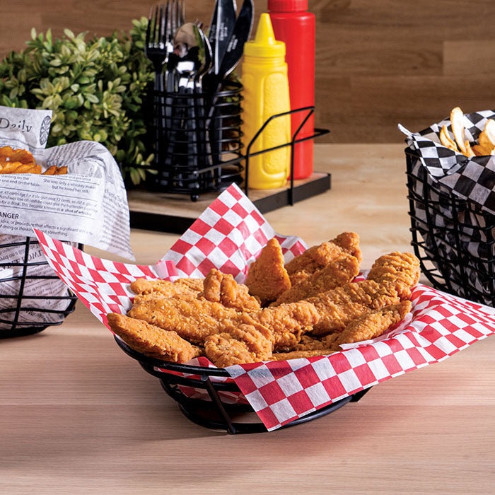 Chicken fingers in a food basket liner