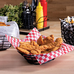 Chicken fingers in a food basket liner