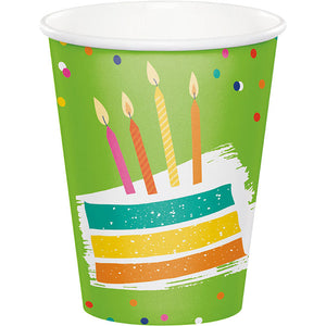 Paper cup with birthday cake and candles on it