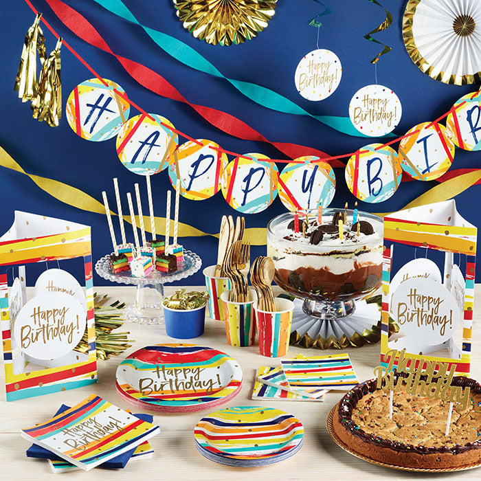 Birthday Stripes party supplies on a table