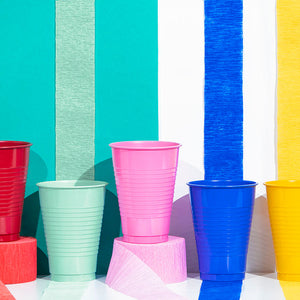 Colorful plastic cups with streamers