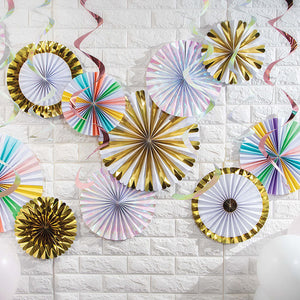 Paper Fans on Wall